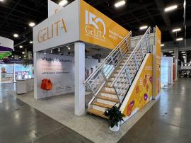 RENTAL: RE-9020 Medium Double Deck Design at 16.5' x 16.5' x 14' High with Storage Closet Under Staircase Landing, (16) Adjustable Can Lights, Extrusion Graphic Frames for Exterior Sides, White Laminated Surround for Vertical Post, Interior Wall Along Sta